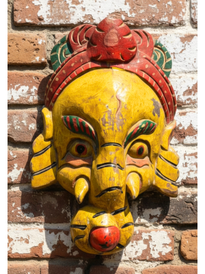 Vintage Hand Carved Yellow Ganesh Mask Hand Painted from Kathmandu dating from 1970's Vintage Hand Carved Yellow Ganesh Mask Hand Painted from Kathmandu dating from 1970's