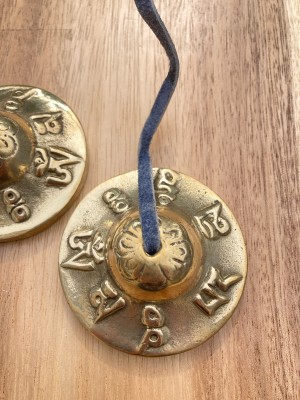 Golden Om Mani Padme Hum Tibetan Buddhist Tingsha Bells ( Buddhist cymbals) - Fair Trade from Kathmandu Golden Om Mani Padme Hum Tibetan Buddhist Tingsha Bells ( Buddhist cymbals) - Fair Trade from Kathmandu